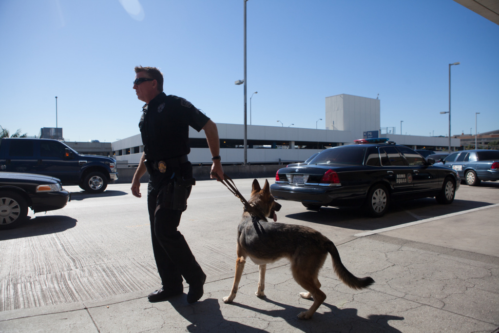 LAX Shooting A police with a K-9 unit at LAX on November 1st, 2013.