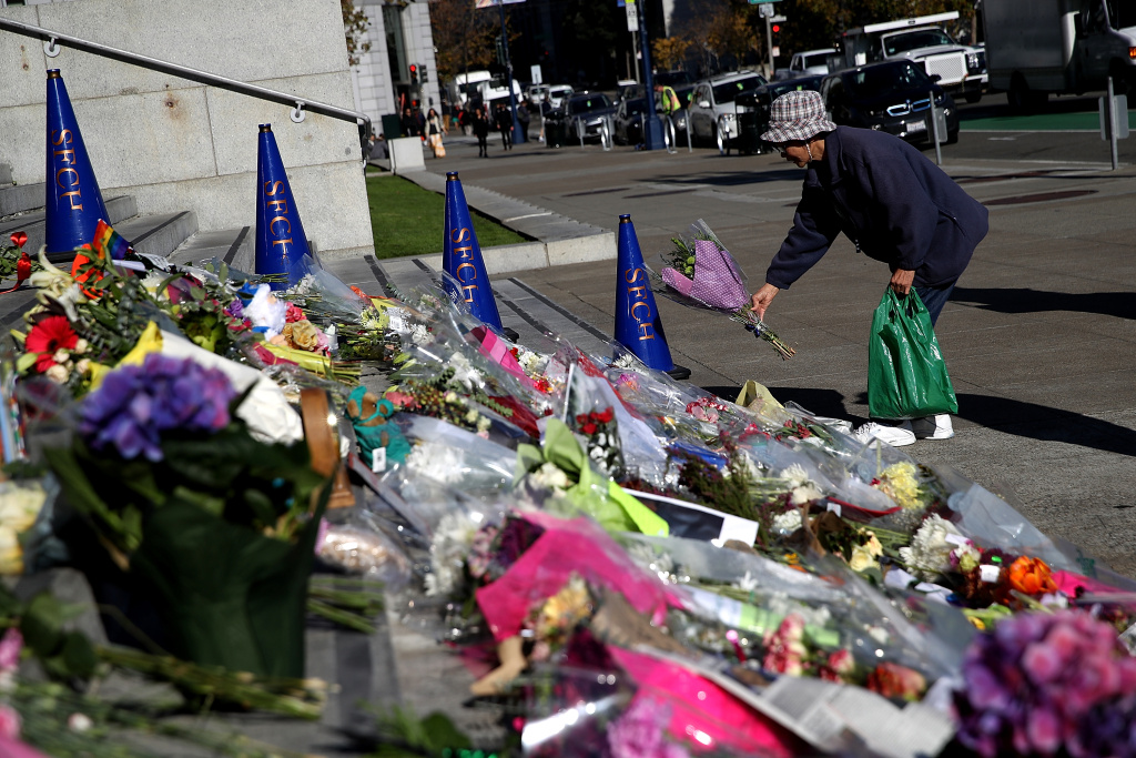 Memorial For Late San Francisco Mayor Ed Lee Continues To Grow A mourner drops off flowers at a makeshift memorial for former San Francisco mayor Ed Lee at San Francisco City Hall on December 14, 2017 in San Francisco, California.