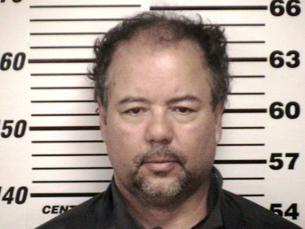 In this handout from the Cuyahoga County Sheriff's Office, Ariel Castro, 52, is seen in a booking photo May 9, 2013 in Cleveland, Ohio.