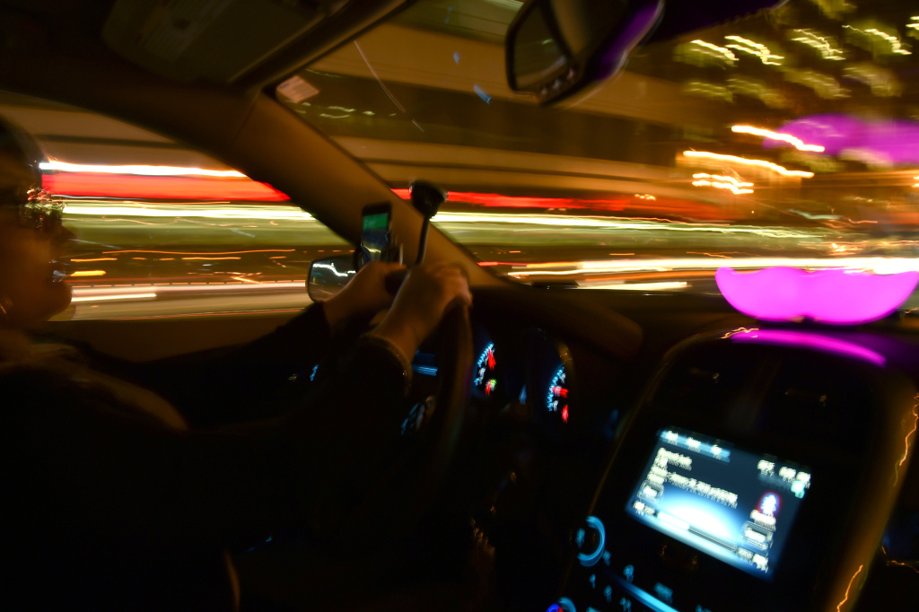 Lyft At Its San Francisco Headquarters Showcasing Lyft Cars, The Glowstache, The Lyft App, Lyft Passengers And Drivers Lyft passengers and drivers ride in a car on February 3, 2016 in San Francisco, California.