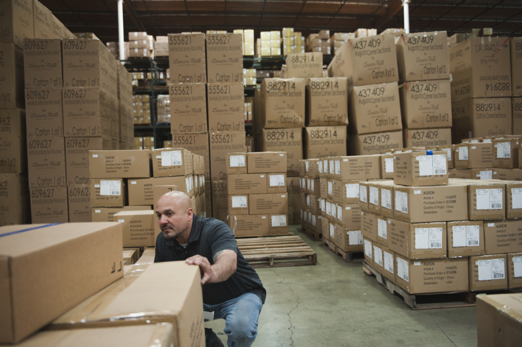 Warehouse Emissions Guillermo Verdugo, a warehouse manager at one of the two facilities owned by Pacific Mountain Logistics in Mira Loma, California, checks stock at the end of the day.
