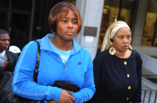 File photo: Wanda Johnson (C), the mother of victim Oscar Grant, leaves a pretrial hearing for Johannes Mehserle, the former Bay Area Rapid Transit officer charged with murder in the shooting death of Grant in Oakland, California last year, at the Criminal Courts Building in Los Angeles on March 26, 2010.