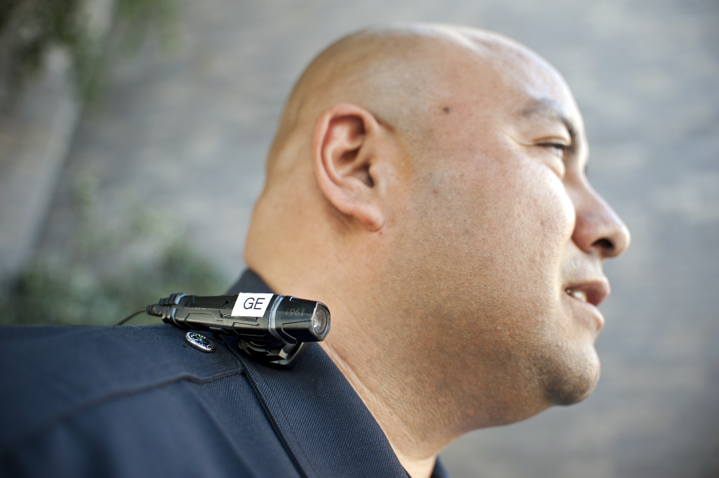 LAPD Body Cameras - 1 LAPD Officer Guillermo Espinoza wears a video camera on his lapel. Espinoza is one of 30 officers in the downtown area that began testing body cameras this month.