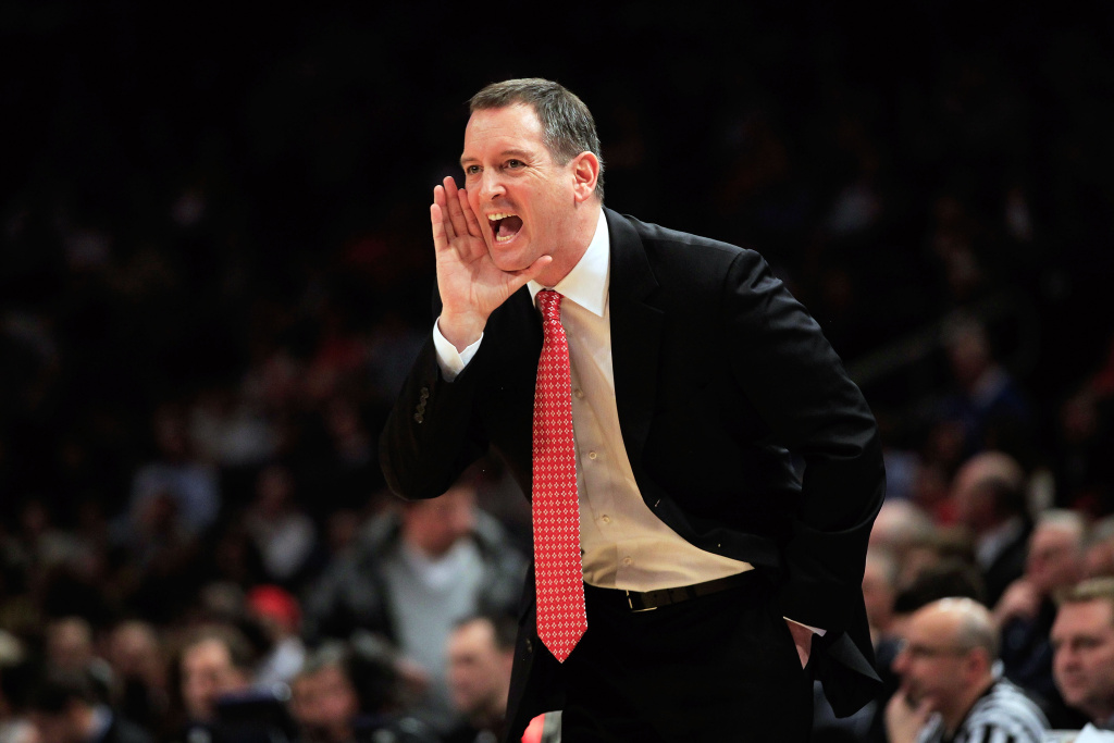 Big East Basketball Tournament - Villanova v Rutgers Head coach Mike Rice of the Rutgers Scarlet Knights coaches from the sideline against the Villanova Wildcats during their first round game of the 2012 BIG EAST Men's Basketball Tournament at Madison Square Garden on March 6, 2012 in New York City.