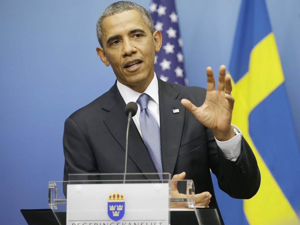 President Obama gestures during his joint news conference with Swedish Prime Minister Fredrik Reinfeldt on Wednesday in Stockholm. The president said the credibility of the international community, Congress and America is on the line with the response to Syria.