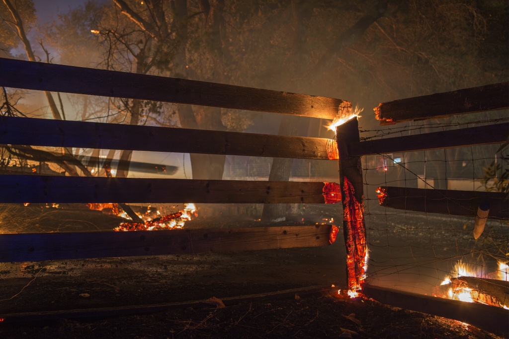 Multiple Wildfires Continue To Ravage Through California Wine Country Property burns in the early morning hours on October 14, 2017 in Sonoma, California.