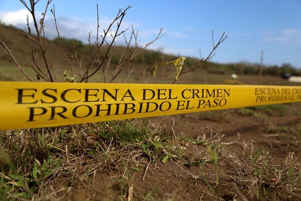 MEXICO-VIOLENCE-GRAVES-MISSING A view of mass graves on the outskirts of Veracruz city, Veracruz state, on March 16, 2017.
Over the past six months, Mexican authorities have found at least 242 bodies in clandestine graves discovered on the initiative of mothers whose children have disappeared in the violent state of Veracruz. / AFP PHOTO / ILSE HUESCA (Photo credit should read ILSE HUESCA/AFP/Getty Images)