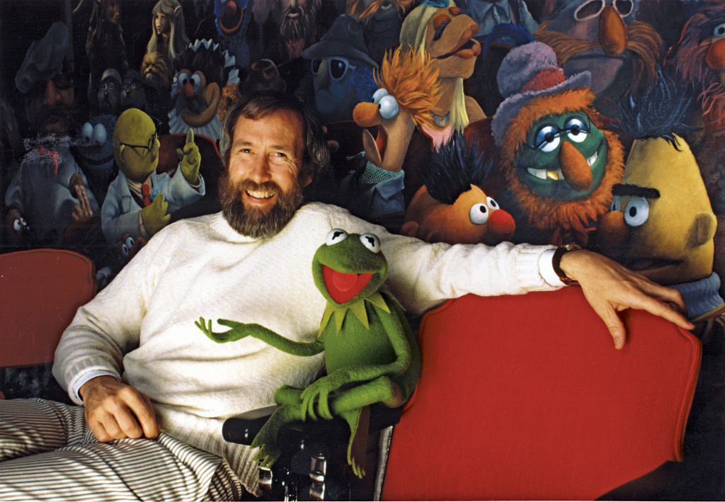 Jim Henson Kermit the Frog Jim Henson and his iconic creation, Kermit the Frog, in front of a mural by Coulter Watt. ©Disney/Muppets.