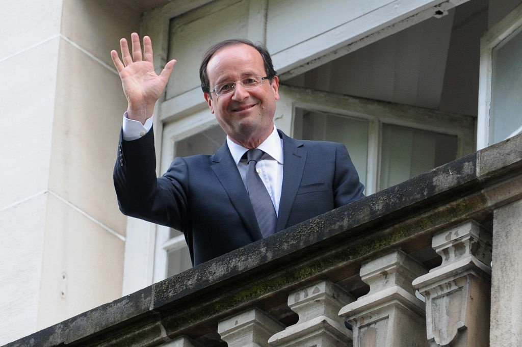 President-Elect Francois Hollande Waves From The Balcony of The Socialist Party Headquarters French President Francois Hollande waves from the balcony of the Socialist Party headquarters on May 7, 2012 in Paris, France. Socialist Francois Hollande defeated incumbent president and UMP candidate Nicolas Sarkozy, with just under 52% of the vote in the second and final round of the French Presidential elections and is the country's first Socialist president for 17 years.