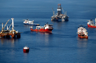 Ships work near the site of the BP Deepwater Horizon oil spill in the Gulf of Mexico off the coast of Louisiana in April 2010.