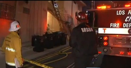 Firefighters investigate the cause of a fatal apartment fire in Chinatown.