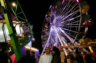 The solar powered Ferris wheel at the Pacific Park amusement park on the Santa Monica Pier will turn out the lights tonight in honor of Earth Hour 2011.