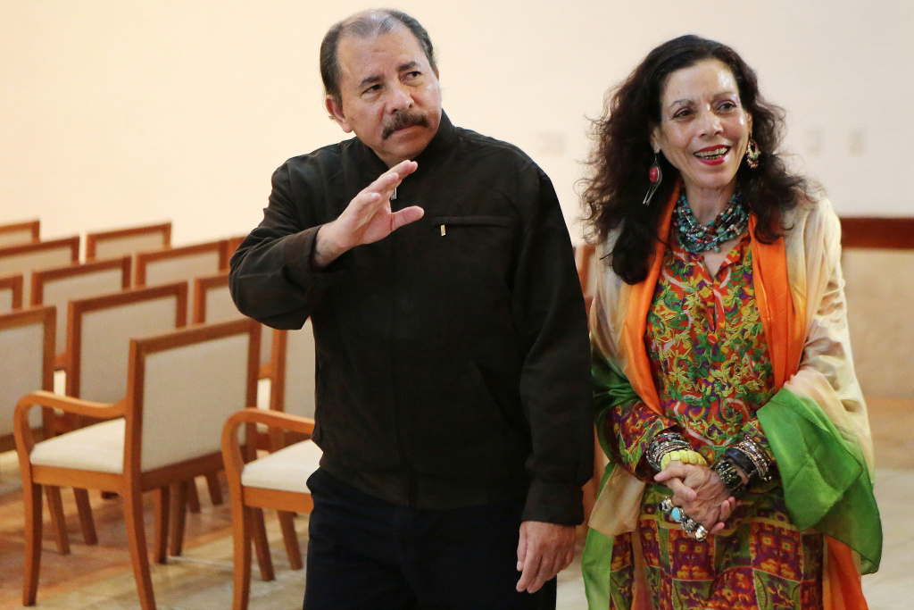 NICARAGUA-ORTEGA-MURILLO Nicaraguan President, Daniel Ortega and his wife Rosario Murillo wave to journalists on December 4, 2013 in Managua.