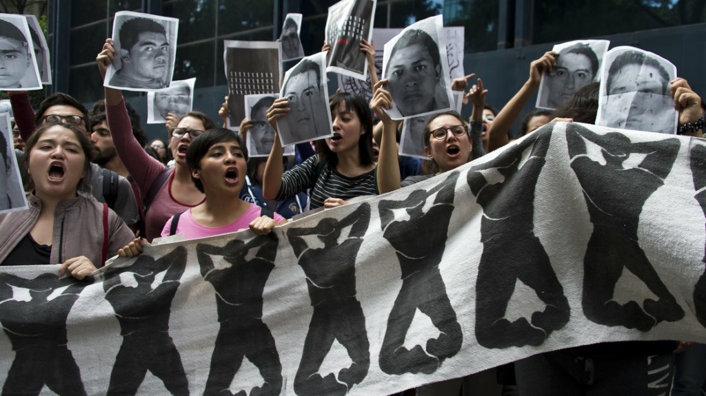 missing students mexico Students chant slogans in front of the Attorney General Office in Mexico City on Wednesday during a protest over the 43 students missing in Iguala, Guerrero State.