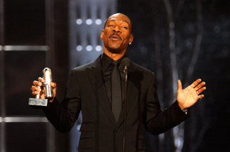 Comedian Eddie Murphy speaks onstage at The First Annual Comedy Awards at Hammerstein Ballroom on March 26, 2011 in New York City.