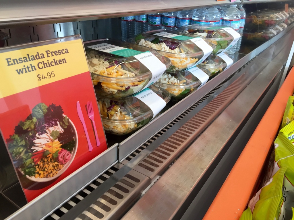A row of ‘Ensalada Fresca with Chicken’ meals at Everytable’s South L.A. location. A row of ‘Ensalada Fresca with Chicken’ meals at Everytable’s South L.A. location.