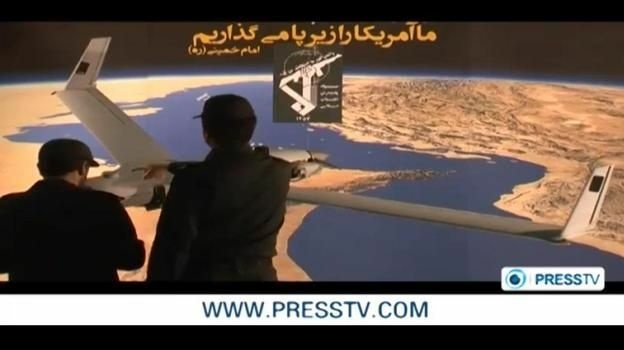 A screen image from the video released by Iranian TV of what the military there claims is a captured U.S. drone.