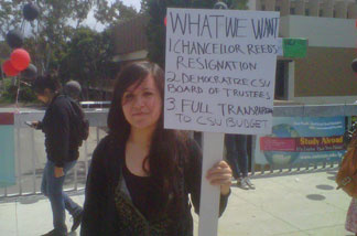 Protester Rosa Huerta says she can't afford to pay higher tuition costs. But Huerta and other students may be forced to as a result of planned cuts at Cal State Dominquez Hills and other CSU schools.