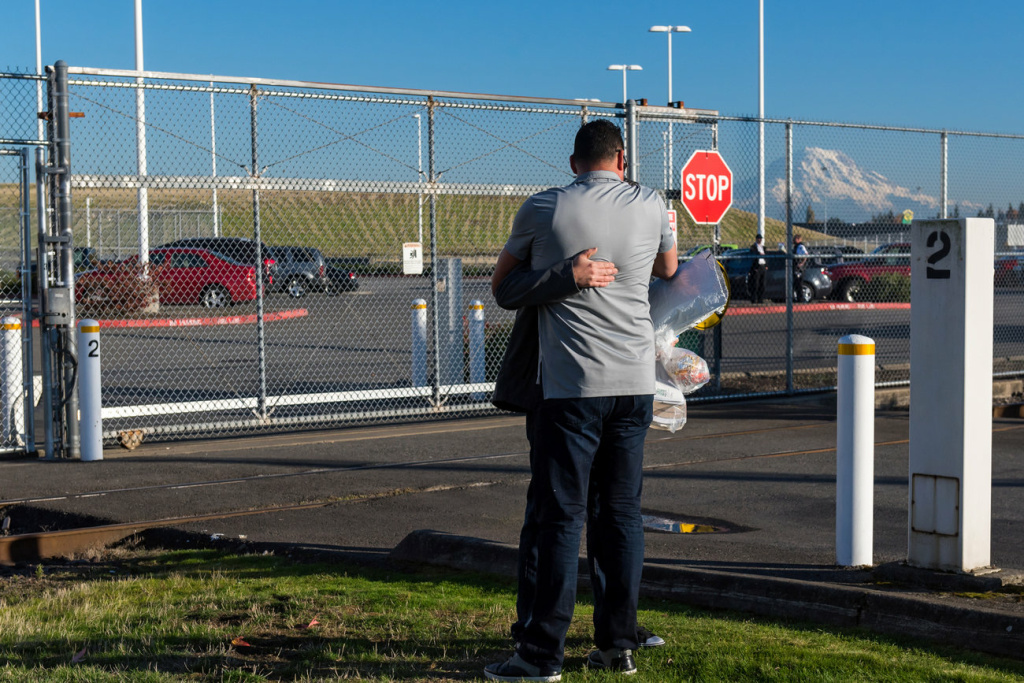 nwdetention_ls-14-edit_custom-ed36c90309b0937217ea2e298eb956a6d278a3de-s1300-c85.jpg On the day he is released, Manuel is hugged by a friend at the detention center. The fact that he had a lawyer greatly improved his chances of avoiding deportation.