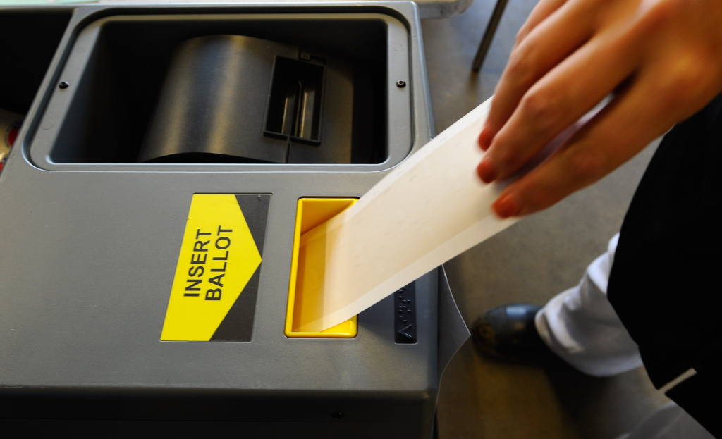 A voter places her ballot into a ballot box after voting for the midterm elections at Los Angeles County Lifeguard headquarters on November 2, 2010 in the Venice neighborhood of Los Angeles, California. A voter places her ballot into a ballot box after voting for the midterm elections at Los Angeles County Lifeguard headquarters on November 2, 2010 in the Venice neighborhood of Los Angeles, California.