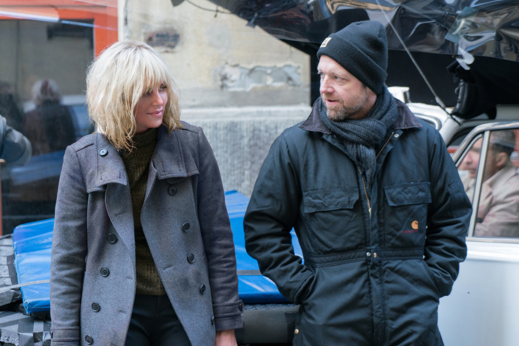CHARLIZE THERON as Lorraine Broughton and director DAVID LEITCH on the set of Atomic Blonde. Charlize Theron as Lorraine Broughton and director David Leitch on the set of