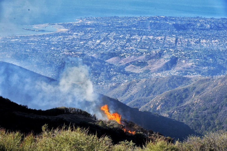 A DC-10 air tanker makes a drop in the foothill above Santa Barbara-Montecito on Thursday, Oct. 29, 2015.