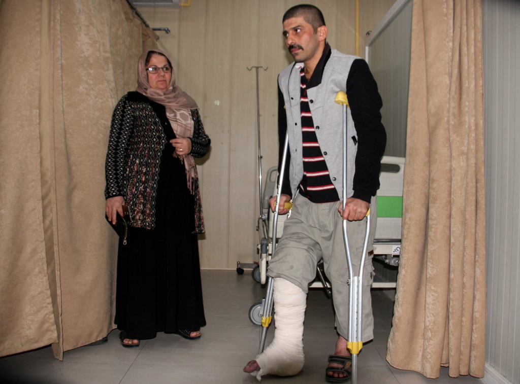 IRAQ-IRAN-TURKEY-QUAKE A man receives aid at Sulaimaniyah Hospital in Iraq on November 12, 2017, after a 7.3 earthquake hit the region.