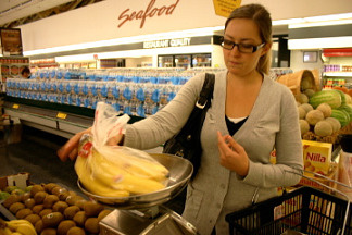 Reporter Katie Evarts shops for groceries for the food stamp challenge. Evarts’ challenge was to spend only $36.50 on her food for one week.
