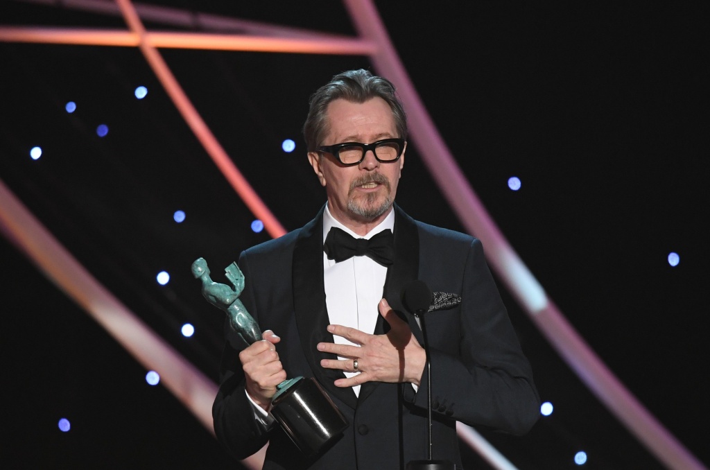 US-ENTERTAINMENT-SAG-FILM-AWARDS-SHOW Actor Gary Oldman accepts the award for Best Actor during the 24th Annual Screen Actors Guild Awards show at The Shrine Auditorium on January 21, 2018 in Los Angeles, California.
