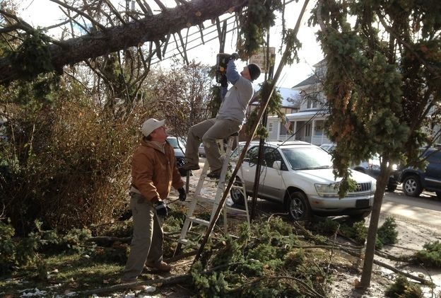 Veterans from around the country have deployed to the Northeast to help after Superstorm Sandy. Jeff Blaney (left) of San Francisco was in the Army and Jamie Havig was a Navy medic attached to the Marines in Iraq.