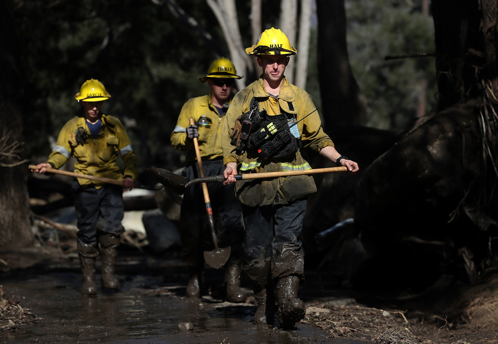 Mudslides Kill At Least 17 People In Santa Barbara County Where Wildfire Scorched Hillside A Los Angeles County urban search and rescue team search a neighborhood that was destroyed by a mudslide on January 11, 2018 in Montecito, California.