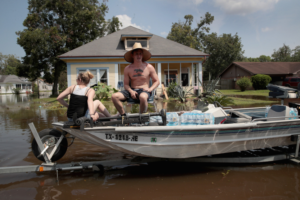 Southeast Texas Inundated After Harvey Makes Second Pass Over The Region Volunteers pass out water to flood victims after torrential rains pounded Texas following Hurricane Harvey.