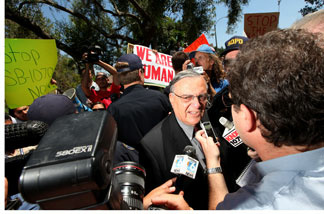 Sheriff Joe Arpaio confronts protesters and speaks with members of the media during a rally at the Rancho Bernardo Inn on August 10, 2010 in Rancho Bernardo, Calif. Arpaio, who is Sheriff of Maricopa County in Arizona, gained national attention for using deputies to conduct raids to apprehend illegal immigrants and building large outdoor prison tents to house inmates.