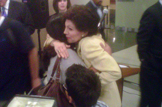 Donor Marion Anderson hugs friends and patients at the new Children's Hospital Los Angeles facility named in her and her husband's honor.