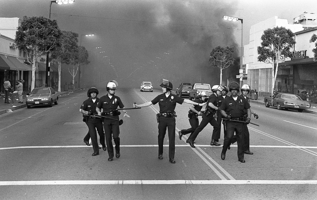 One of a series of photographs taken by photographer Gary Leonard and his fourteen-year-old son, David Leonard, during the Los Angeles Riots, 1992. One of a series of photographs taken by photographer Gary Leonard and his fourteen-year-old son, David Leonard, during the Los Angeles Riots, 1992.