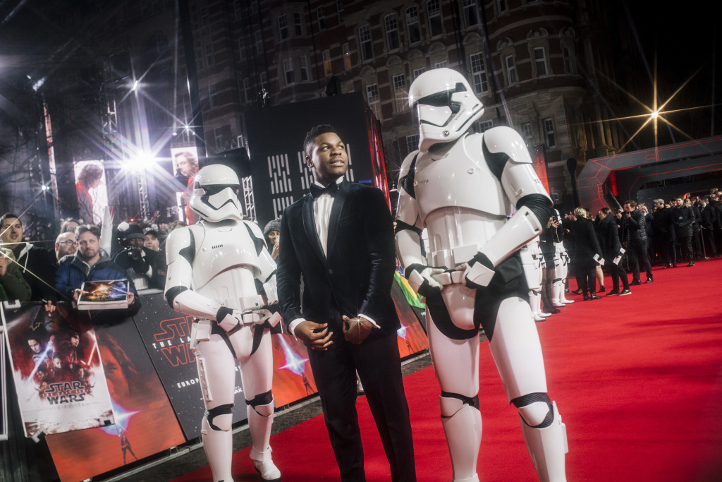 'Star Wars: The Last Jedi' - European Premiere LONDON, ENGLAND - DECEMBER 12: (EDITORS NOTE: This image was created using a starburst filter.) John Boyega attends the European Premiere of Star Wars: The Last Jedi at the Royal Albert Hall on December 12, 2017 in London, England. (Photo by Gareth Cattermole/Getty Images for Disney)