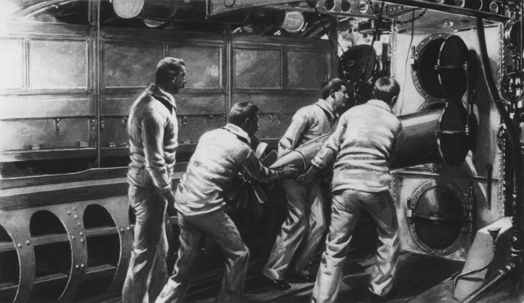 German Torpedoes September 30, 1914: Crew charge one of three torpedo tubes in a German submarine.