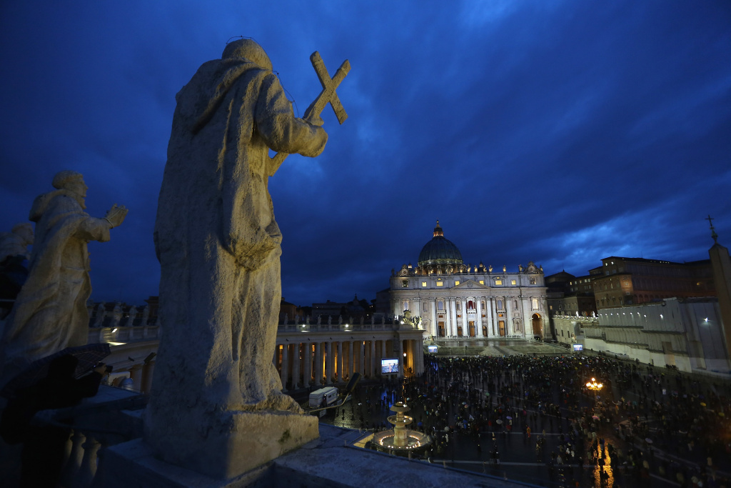 The Papal Conclave Day One People gather in St Peter's Square as Cardinals meet in the Sistine Chapel for the 1st day of the conclave on March 12, 2013 in Vatican City, Vatican.