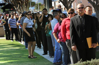Mercer 12458 Unemployed Americans line up to enter a job fair on the first day of the Labor Day long weekend in the City of El Monte outside of Los Angeles on September 4, 2010. US unemployment jumped to 9.6 percent in August, the Labor Department said, showing the recovering economy is still struggling to create jobs.