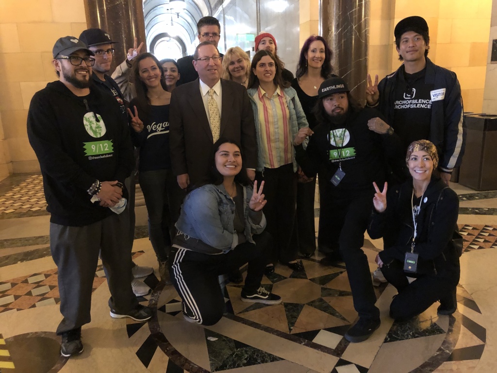 Vegan motion Councilman Paul Koretz stands with vegan activists before introducing a motion in City Council to bring more vegan food to large venues.