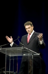 Mercer 20193 Texas Governor Rick Perry speaks to an estimated 30,000 attendees at the non-denominational prayer and fasting event, 'The Response,' on August 6, 2011 in Houston, Texas.