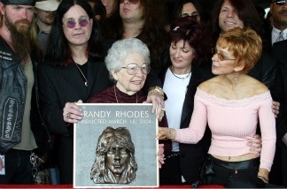 Mercer 16149 The mother of Randy Rhoads, Delores Rhoads, along with rockers (L-R) Zakk Wylde, Ozzy Osbourne, guitarist Yngwie Malmsteen and Sharon Osbourne attend the ceremony in which former guitarist Randy Rhoads was honored posthumously and inducted into the Hollywood Rockwalk on March 18, 2004 in Hollywood, California. (Photo by Frazer Harrison/Getty Images)