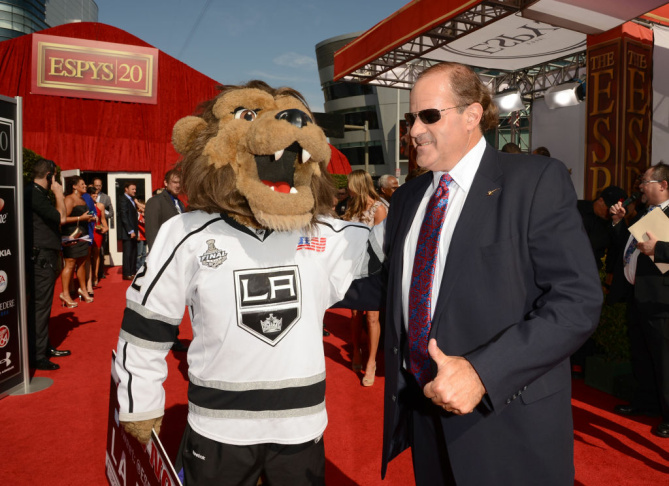 The 2012 ESPY Awards - Red Carpet LOS ANGELES, CA - JULY 11: Sportscaster Chris Berman (R) and Bailey the Los Angeles Kings Mascot arrive at the 2012 ESPY Awards at Nokia Theatre L.A. Live on July 11, 2012 in Los Angeles, California. (Photo by Jason Merritt/Getty Images)
