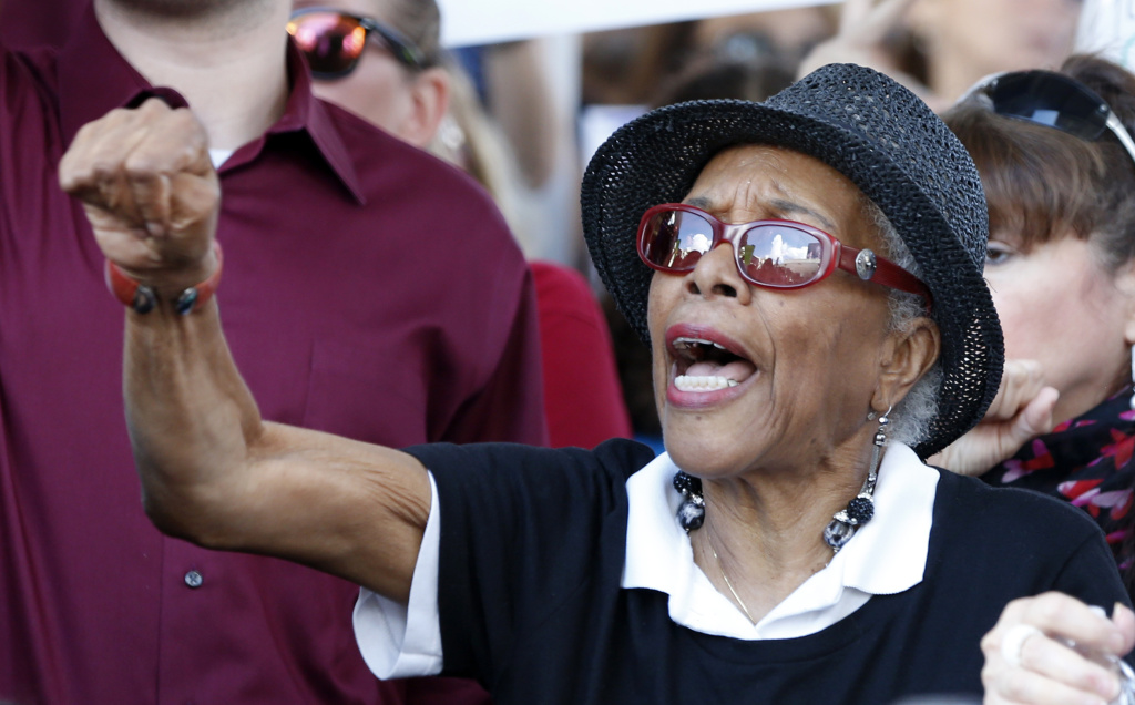 US-SCHOOL-SHOOTING-PROTEST Protesters cheer at a rally for gun control at the Broward County Federal Courthouse in Fort Lauderdale, Florida on February 17, 2018.