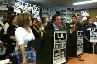 Maria Elena Durazo of the Los Angeles County Federation of Labor, and Rick Icaza of United Food and Commercial Workers, speak at a gathering of labor leaders on June 8, 2011 to rally in advance of a possible strike by grocery workers.