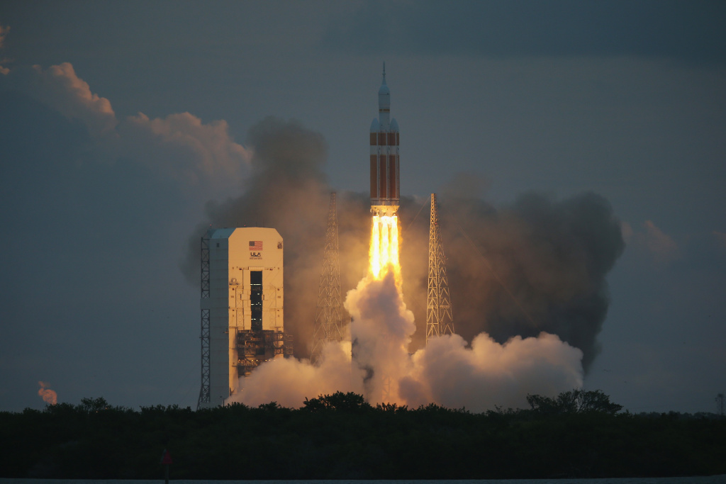 NASA's Orion Spacecraft Launches Unmanned Test Flight CAPE CANAVERAL, FL - DECEMBER 05: The United Launch Alliance Delta 4 rocket carrying NASA's first Orion deep space exploration craft takes off from its launchpad on December 5, 2014 in Cape Canaveral, Florida. The heavy-lift rocket will boost the unmanned Orion capsule to an altitude of 3,600 miles, and returning for a splashdown west of Baja California after a four and half hour flight.