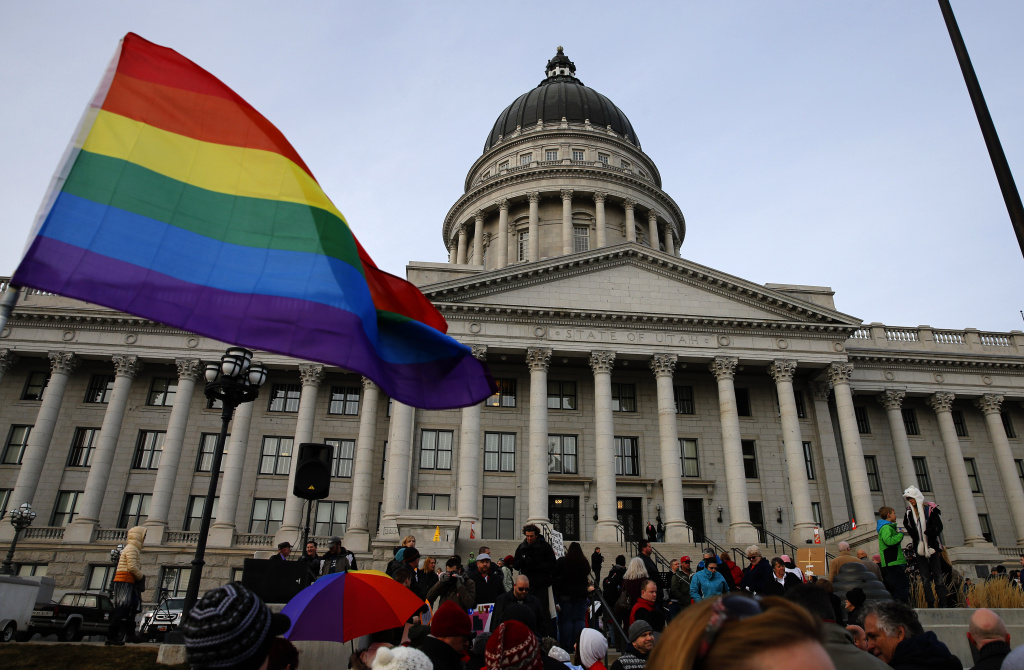 Pro and Anti-Gay Marriage Activists Rally At Utah's Capitol SLAT LAKE CITY, UT - JANUARY 28: Supporters hold a pro-gay marriage rally outside the Utah State Capitol on January 28, 2014 in Salt Lake City, Utah. Several weeks ago a federal judge ruled unconstitutional a voter-approved ban on same-sex marriage in the state of Utah. The ruling has since been stayed and is working it's way through the legal system. (Photo by George Frey/Getty Images)