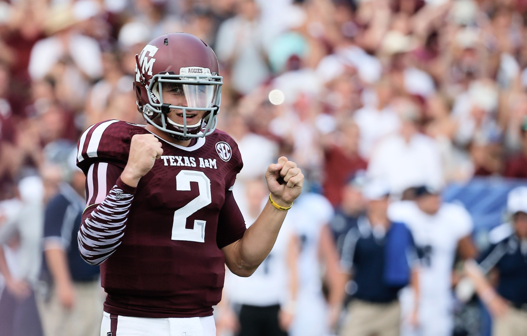 Rice v Texas A&M Johnny Manziel #2 of the Texas A&M Aggies celebrates a fourth quarter touchdown during the game against the Rice Owls at Kyle Field on August 31, 2013 in College Station, Texas.