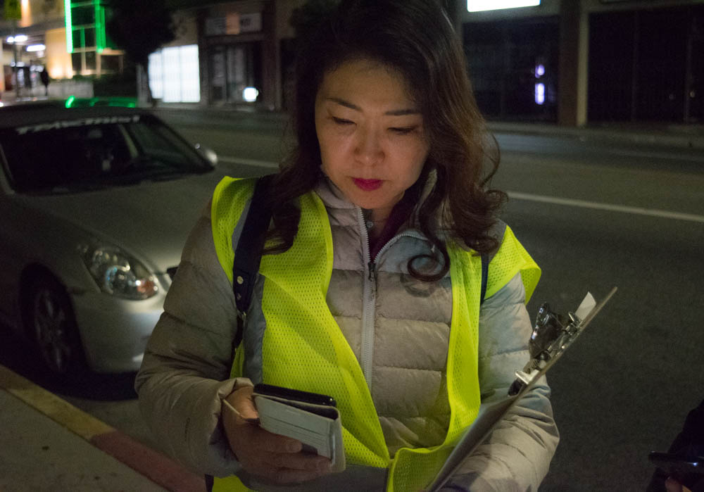 Hyepin Im reviews the tally form for the 2018 Koreatown Homeless Count during her volunteer shift the evening of Jan. 25, 2018. Volunteers traveled in small groups to collect accurate data on the homeless population in different census tracts.
Hyepin Im reviews the tally form for the 2018 Koreatown Homeless Count during her volunteer shift the evening of Jan. 25, 2018. Volunteers traveled in small groups to collect accurate data on the homeless population in different census tracts.