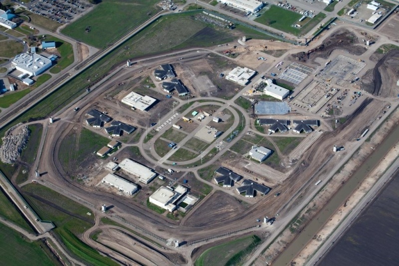 Prison officials hope a new medical facility will appease federal